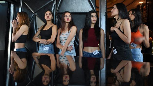 Models wait to appear before judges during the Lakme Fashion Week model auditions at The St. Regis in Mumbai on Wednesday. (Satyabrata Tripathy / HT Photo)