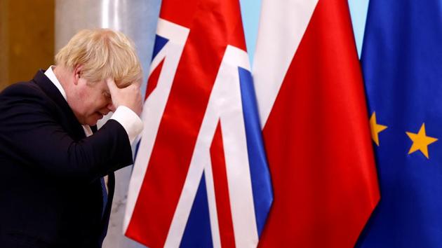 Britain's Foreign Secretary Boris Johnson attends a family photo session during his and British Prime Minister Theresa May's visit to Poland, at the Chancellery of the Prime Minister in Warsaw, Poland on December 21, 2017. (Kacper Pempel / REUTERS) Britain's Foreign Secretary Boris Johnson attends a family photo session during his and British Prime Minister Theresa May's visit to Poland, at the Chancellery of the Prime Minister in Warsaw, Poland on December 21, 2017. (Kacper Pempel / REUTERS)