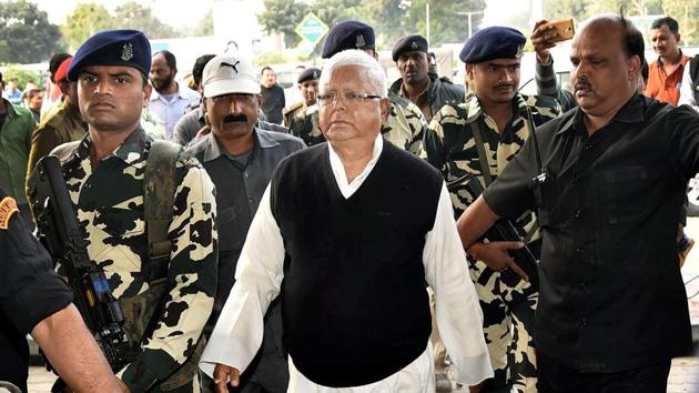 RJD chief Lalu Prasad arrives at the Patna airport on Friday as he prepares to leave for Ranchi where a CBI court is expected to pronounce a judgment in a fodder scam case on Saturday. (PTI) RJD chief Lalu Prasad arrives at the Patna airport on Friday as he prepares to leave for Ranchi where a CBI court is expected to pronounce a judgment in a fodder scam case on Saturday. (PTI)