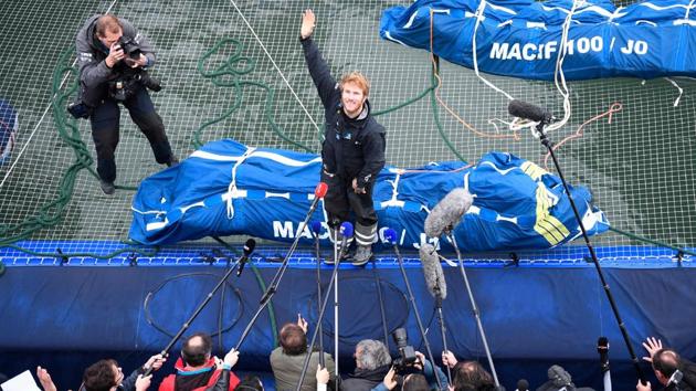 French skipper Francois Gabart answers journalists' questions upon his arrival at the end of a solo world navigation, on December 17, 2017 in Brest, France. Frenchman Francois Gabart smashed the world record for the fastest solo navigation of the globe, in 42 days, 16 hours, 40 minutes and 35 seconds. (Damien Meyer / AFP) French skipper Francois Gabart answers journalists' questions upon his arrival at the end of a solo world navigation, on December 17, 2017 in Brest, France. Frenchman Francois Gabart smashed the world record for the fastest solo navigation of the globe, in 42 days, 16 hours, 40 minutes and 35 seconds. (Damien Meyer / AFP)