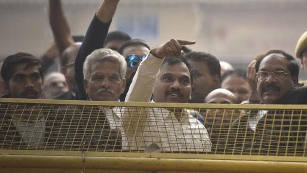 Former telecom minister A Raja celebrates along with his supporters after he was acquitted by a special court in the 2G spectrum case, in New Delhi (Sonu Mehta / HT Photo) Former telecom minister A Raja celebrates along with his supporters after he was acquitted by a special court in the 2G spectrum case, in New Delhi (Sonu Mehta / HT Photo)