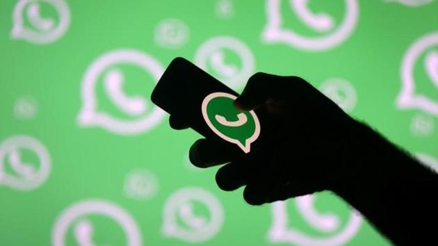 A man poses with a smartphone in front of displayed Whatsapp logo in this illustration. (Reuters File) A man poses with a smartphone in front of displayed Whatsapp logo in this illustration. (Reuters File)