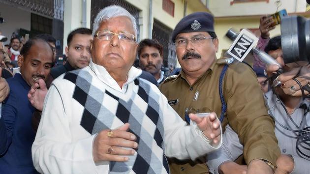RJD supremo Lalu Prasad Yadav escorted by police officials after being convicted by a special CBI court in a fodder scam case, in Ranchi on Saturday. (PTi Photo) RJD supremo Lalu Prasad Yadav escorted by police officials after being convicted by a special CBI court in a fodder scam case, in Ranchi on Saturday. (PTi Photo)