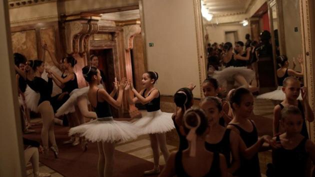 Ballerinas of Municipal Theatre ballet school, prepare backstage before a rehearsal for their year-end performance. A first instalment of a 2.9 billion-reais loan allowed the state government to workers their unpaid 2016 year-end bonuses as well as October salaries. Another instalment expected to be released in January will go toward November salaries, the state finance agency said. (Ricardo Moraes / REUTERS) Ballerinas of Municipal Theatre ballet school, prepare backstage before a rehearsal for their year-end performance. A first instalment of a 2.9 billion-reais loan allowed the state government to workers their unpaid 2016 year-end bonuses as well as October salaries. Another instalment expected to be released in January will go toward November salaries, the state finance agency said. (Ricardo Moraes / REUTERS)