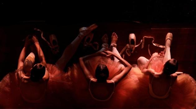 Ballerinas at the Municipal Theatre ballet school prepare backstage before a rehearsal for a performance in Brazil. The theatre has gone quiet this year as months of unpaid wages emptied its calendar of major works and pushed many ballerinas and opera singers into poverty. (Ricardo Moraes / REUTERS) Ballerinas at the Municipal Theatre ballet school prepare backstage before a rehearsal for a performance in Brazil. The theatre has gone quiet this year as months of unpaid wages emptied its calendar of major works and pushed many ballerinas and opera singers into poverty. (Ricardo Moraes / REUTERS)
