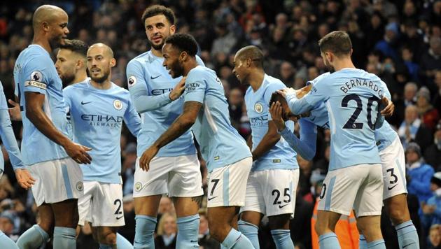 Manchester City's Danilo, second right, celebrates with teammates after scoring his side's fourth goal during the English Premier League match between Manchester City and Bournemouth at Etihad Stadium, in Manchester, England on Saturday. (AP) Manchester City's Danilo, second right, celebrates with teammates after scoring his side's fourth goal during the English Premier League match between Manchester City and Bournemouth at Etihad Stadium, in Manchester, England on Saturday. (AP)