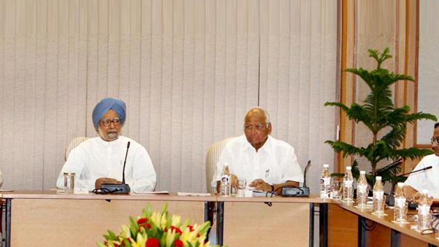 Former prime minister Manmohan Singh with NCP leader Sharad Pawar in New Delhi in 2012. (PTI File Photo) Former prime minister Manmohan Singh with NCP leader Sharad Pawar in New Delhi in 2012. (PTI File Photo)