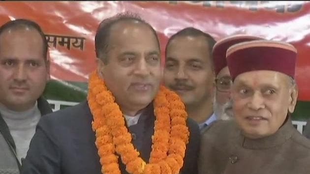 Jairam Thakur with Prem Kumar Dhumal in Shimla on Sunday.(ANI/Twitter)