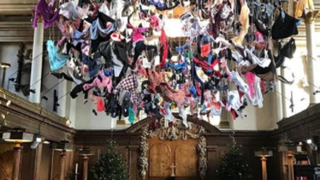 From afar, the clothes hang in a mass like a ghostly chandelier adorning the nave of the church. (Instagram /Arabella Dorman) From afar, the clothes hang in a mass like a ghostly chandelier adorning the nave of the church. (Instagram /Arabella Dorman)