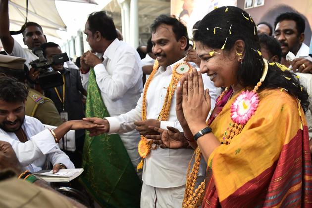 DMK leader and former Union minister A Raja and his party colleague and Rajya Sabha MP Kanimozhi were given a rousing reception following their acquittal in 2G telecom case by a special court upon their arrival at the airport in Chennai. (PTI Photo) DMK leader and former Union minister A Raja and his party colleague and Rajya Sabha MP Kanimozhi were given a rousing reception following their acquittal in 2G telecom case by a special court upon their arrival at the airport in Chennai. (PTI Photo)