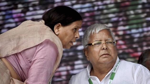 RJD chief Lalu Prasad Yadav with his wife and RJD leader Rabri Devi during the 'BJP bhagao, desh bachao' rally at Gandhi Maidan in Patna. (PTI File Photo) RJD chief Lalu Prasad Yadav with his wife and RJD leader Rabri Devi during the 'BJP bhagao, desh bachao' rally at Gandhi Maidan in Patna. (PTI File Photo)