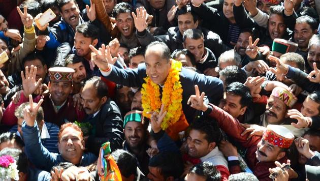 BJP supporters celebrate with Jai Ram Thakur after he was named the Himachal Pradesh CM pick on Sunday. (Deepak Sansta/HT Photo) BJP supporters celebrate with Jai Ram Thakur after he was named the Himachal Pradesh CM pick on Sunday. (Deepak Sansta/HT Photo)