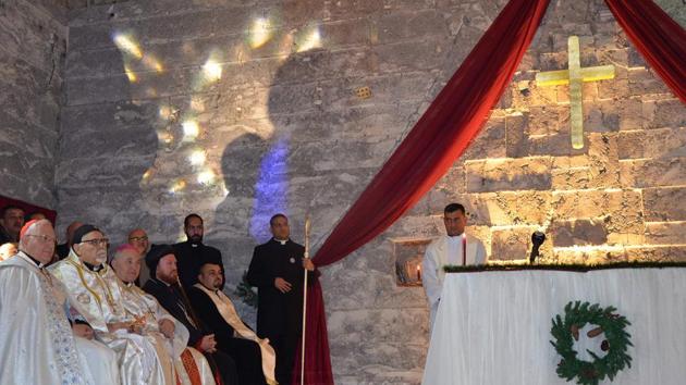 Iraqis clergymen attend a Christmas mass at the Saint Paul's church on Sunday in the country's second city Mosul. (AFP) Iraqis clergymen attend a Christmas mass at the Saint Paul's church on Sunday in the country's second city Mosul. (AFP)