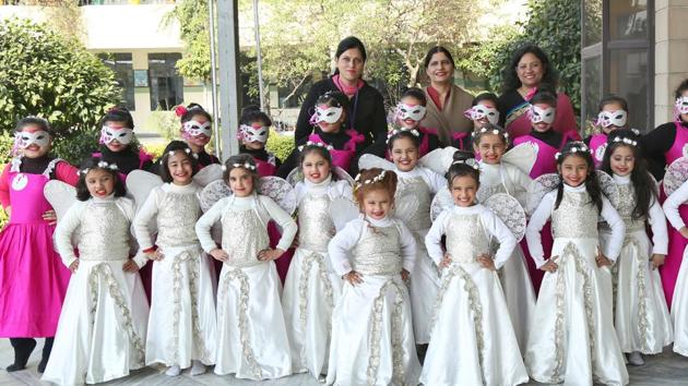 School kids pose for a photograph as they celebrate Christmas at Green Land School in Ludhiana on Saturday. (HT Photo) School kids pose for a photograph as they celebrate Christmas at Green Land School in Ludhiana on Saturday. (HT Photo)