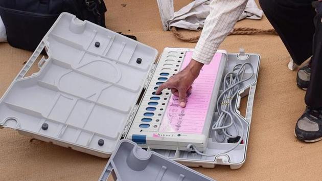 Polling officials checking the electronic voting machines in Ahmedabad. (PTI Photo/Representative photo) Polling officials checking the electronic voting machines in Ahmedabad. (PTI Photo/Representative photo)
