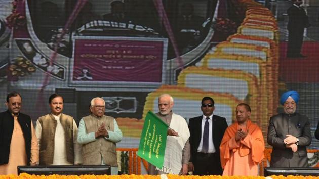 Prime Minister Narendra Modi flags off the Botanical Garden to Kalkaji Mandir stretch of the Delhi Metro’s Magenta Line along with Uttar Pradesh chief minister Yogi Adityanath at Amity University Grounds in Noida, Uttar Pradesh on December 25, 2017. The 12.64-kilometre section of Delhi Metro’s magenta line inaugurated today connects Noida to southeast delhi with seven other stations along the way. (Virendra Singh Gosain / HT Photo) Prime Minister Narendra Modi flags off the Botanical Garden to Kalkaji Mandir stretch of the Delhi Metro’s Magenta Line along with Uttar Pradesh chief minister Yogi Adityanath at Amity University Grounds in Noida, Uttar Pradesh on December 25, 2017. The 12.64-kilometre section of Delhi Metro’s magenta line inaugurated today connects Noida to southeast delhi with seven other stations along the way. (Virendra Singh Gosain / HT Photo)