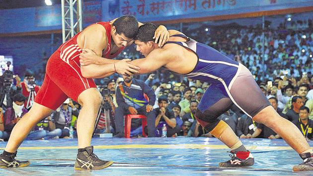 Abhijit Katke (red), known for his aggressive style, started with some good moves and raced to a 3-1 lead in the first round. (HT PHOTO) Abhijit Katke (red), known for his aggressive style, started with some good moves and raced to a 3-1 lead in the first round. (HT PHOTO)