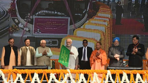 Prime Minister Narendra Modi, flanked by Uttar Pradesh governor Ram Naik and chief minister Yogi Adityanath, inaugurated Delhi Metro’s Magenta Line on Sunday. (Virendra Singh Gosain/HT Photo) Prime Minister Narendra Modi, flanked by Uttar Pradesh governor Ram Naik and chief minister Yogi Adityanath, inaugurated Delhi Metro’s Magenta Line on Sunday. (Virendra Singh Gosain/HT Photo)