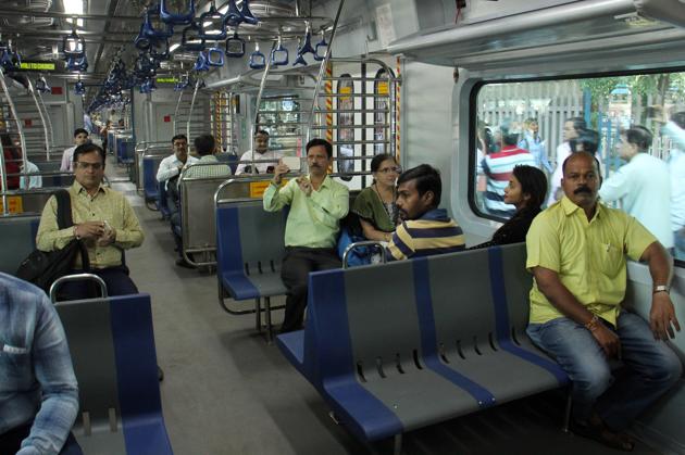 Commuters board the air-conditioned local train at Borivli station in Mumbai on Monday. (Pramod Thakur/HT Photo) Commuters board the air-conditioned local train at Borivli station in Mumbai on Monday. (Pramod Thakur/HT Photo)