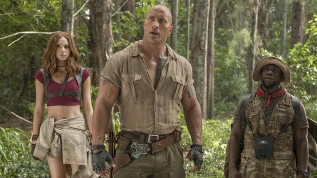 This image released by Sony Pictures shows Karen Gillan, from left, Dwayne Johnson and Kevin Hart in Jumanji: Welcome to the Jungle. (AP) This image released by Sony Pictures shows Karen Gillan, from left, Dwayne Johnson and Kevin Hart in Jumanji: Welcome to the Jungle. (AP)