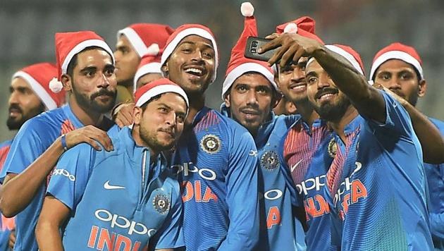 Indian cricket team players celebrate after their T20 series win over Sri Lanka in Mumbai on Sunday. (PTI)