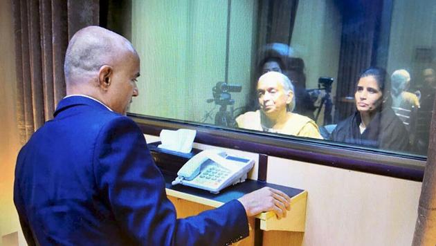 Former Indian Navy officer Kulbhushan Jadhav's wife and mother meet him in Islamabad on Monday. PTI Photo / Twitter@foreignofficepk Former Indian Navy officer Kulbhushan Jadhav's wife and mother meet him in Islamabad on Monday. PTI Photo / Twitter@foreignofficepk