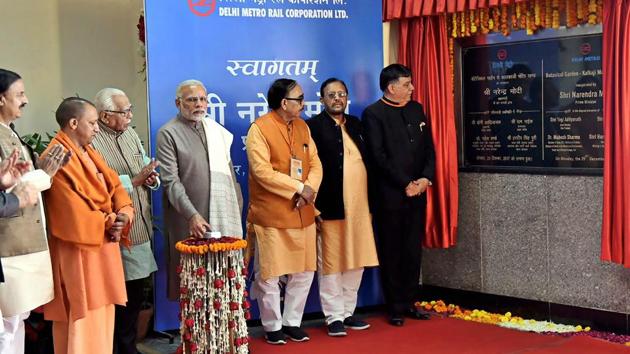 Prime Minister Narendra Modi unveiled the plaque to mark the inauguration of Botanical Garden-Kalkaji Metro Line at Botanical Garden, in Noida, Uttar Pradesh accompanied by Uttar Pradesh governor, Ram Naik, Uttar Pradesh CM Yogi Adityanath, and Minister of State for Culture (I/C) and Environment, Forest & Climate Change, Mahesh Sharma. (PIB / PTI) Prime Minister Narendra Modi unveiled the plaque to mark the inauguration of Botanical Garden-Kalkaji Metro Line at Botanical Garden, in Noida, Uttar Pradesh accompanied by Uttar Pradesh governor, Ram Naik, Uttar Pradesh CM Yogi Adityanath, and Minister of State for Culture (I/C) and Environment, Forest & Climate Change, Mahesh Sharma. (PIB / PTI)