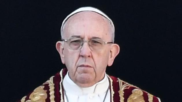 Pope Francis looks on from the balcony of St Peter's basilica during the traditional "Urbi et Orbi" Christmas address on Monday in Vatican. (AFP) Pope Francis looks on from the balcony of St Peter's basilica during the traditional "Urbi et Orbi" Christmas address on Monday in Vatican. (AFP)