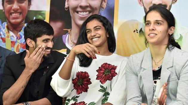 Saina Nehwal (R) regained her national title, while PV Sindhu (C) and Kidambi Srikanth both enjoyed a stellar year in international badminton.(PTI)