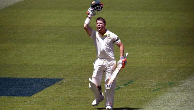 Australia's David Warner celebrates scoring his century against England on the first day of the fourth Ashes Test at the Melbourne Cricket Ground on Tuesday. (AFP) Australia's David Warner celebrates scoring his century against England on the first day of the fourth Ashes Test at the Melbourne Cricket Ground on Tuesday. (AFP)