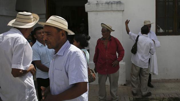 Men wearing traditional pintao hats leave Sunday Mass in La Pintada, Panama. Distinct from the famed ‘Panama hat’ which is actually from Ecuador, “The pintao hat has become an integral part of regional outfits throughout the country worn during traditional dances and community festivities,” the United Nations heritage arm’s said in a statement. (Arnulfo Franco / AP)
