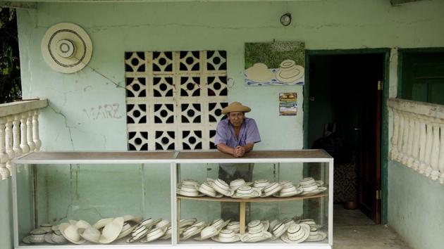 Pedro Gonzalez sells pintao hats outside his home in La Pintada. Depending on the quality of the work pintao hats can cost hundreds of dollars. An estimated 4,000 of La Pintada’s 25,000 residents work creating or selling the hats. Pedro Mendoza, one 50-year-old hat maker, hopes that UNESCO recognition takes the pintao beyond Panama. “It’s really good what’s happened,” he said. “The hat for us is a way of life.” (Arnulfo Franco / AP)