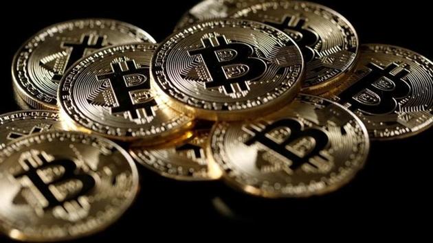 Bitcoin is a decentralised digital currency that is transacted peer to peer using cryptography. (Reuters illustration) Bitcoin is a decentralised digital currency that is transacted peer to peer using cryptography. (Reuters illustration)