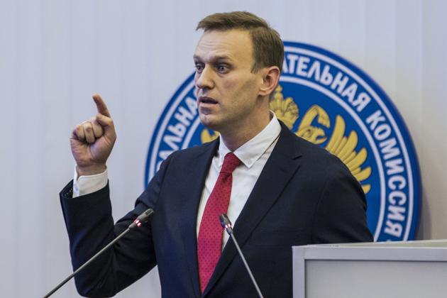 Russian opposition leader Alexei Navalny speaks at the Russia's Central Election commission in Moscow on December 25, 2017. (AP) Russian opposition leader Alexei Navalny speaks at the Russia's Central Election commission in Moscow on December 25, 2017. (AP)