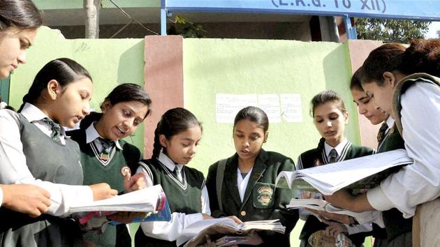 Class 12 students take a last look to their notes as they prepare to appear in their CBSE exams at an examination centre in Moradabad last year. (PTI) Class 12 students take a last look to their notes as they prepare to appear in their CBSE exams at an examination centre in Moradabad last year. (PTI)
