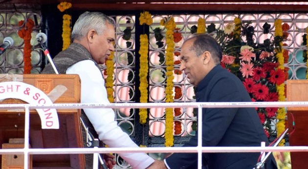 Himachal Pradesh governor Acharya Dev Vrat greets new chief minister Jai ram Thakur after the swearing-in ceremony at Ridge in Shimla on Wednesday. (PTI Photo) Himachal Pradesh governor Acharya Dev Vrat greets new chief minister Jai ram Thakur after the swearing-in ceremony at Ridge in Shimla on Wednesday. (PTI Photo)