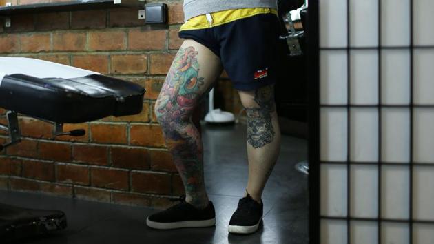 “Even now people are judging, they don’t think that people should get big tattoos, especially women,” said Zhuo, who has tattoos across both sides of her scalp. “Still, people think it’s more acceptable for men to get a tattoo than women and some get smaller ones to hide it from older family members or work,” she added. (AFP)
