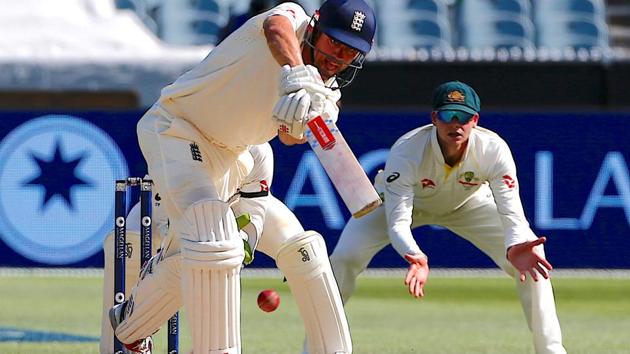 Australia's captain Steve Smith watches England's Alastair Cook hit a shot during the second day of the fourth Ashes cricket Test match at Melbourne on Wednesday. Cook scored his 32nd Test century at the MCG. Get full cricket score of Australia vs England, fourth Ashes Test here.(REUTERS)