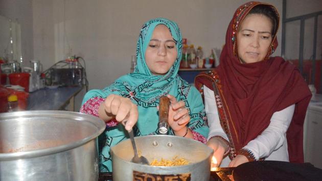 The restaurant has three employees who are all victims of violence. Living with the memories of multiple attacks in 2013 that killed nearly 200 people, Hazara set up the restaurant, hoping to provide a way to help families and female victims of the attacks. (Banaras Khan / AFP) 