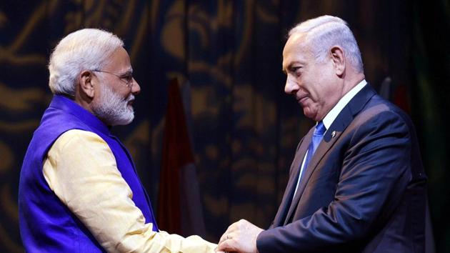 File photo of Prime Minister Narendra Modi shaking hands with Israeli Prime Minister Benjamin Netanyahu in Tel Aviv, Israel. (PTI) File photo of Prime Minister Narendra Modi shaking hands with Israeli Prime Minister Benjamin Netanyahu in Tel Aviv, Israel. (PTI)