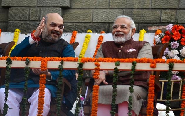 Bharatiya Janata Party (BJP) president Amit Shah and Prime Minister Narendra Modi at the oath-taking ceremony in Shimla on Wednesday. (Deepak Sansta/HT) Bharatiya Janata Party (BJP) president Amit Shah and Prime Minister Narendra Modi at the oath-taking ceremony in Shimla on Wednesday. (Deepak Sansta/HT)