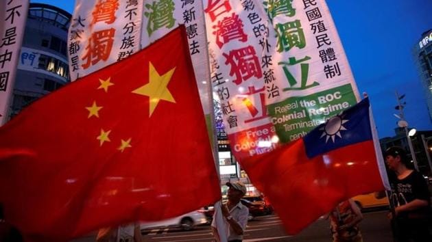 File photo of members of a Taiwanese independence group march with flags around a group of pro-China supporters holding a rally calling for peaceful reunification, in Taipei, Taiwan, on May 14, 2016. (Reuters) File photo of members of a Taiwanese independence group march with flags around a group of pro-China supporters holding a rally calling for peaceful reunification, in Taipei, Taiwan, on May 14, 2016. (Reuters)