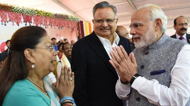 Chief minister Vasundhara Raje greets Prime Minister Narendra Modi at the swearing in ceremony of Vijay Rupani as Chief Minister of Gujarat on Tuesday. (HT Photo) Chief minister Vasundhara Raje greets Prime Minister Narendra Modi at the swearing in ceremony of Vijay Rupani as Chief Minister of Gujarat on Tuesday. (HT Photo)