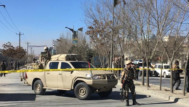 Afghan security forces near the site of the blasts. Afghan Voice has Shiite links but there was no immediate claim of responsibility. Taliban spokesman Zabihullah Mujahid issued statement on Twitter denying involvement. (Shah Marai / AFP)