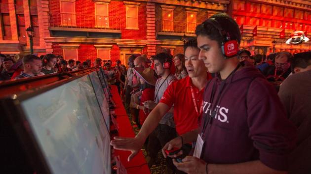 People game in the Nintendo exhibit on opening day of the Electronic Entertainment Expo (E3) at the Los Angeles Convention Center on June 13, 2017 in Los Angeles, California. (AFP File Photo) People game in the Nintendo exhibit on opening day of the Electronic Entertainment Expo (E3) at the Los Angeles Convention Center on June 13, 2017 in Los Angeles, California. (AFP File Photo)