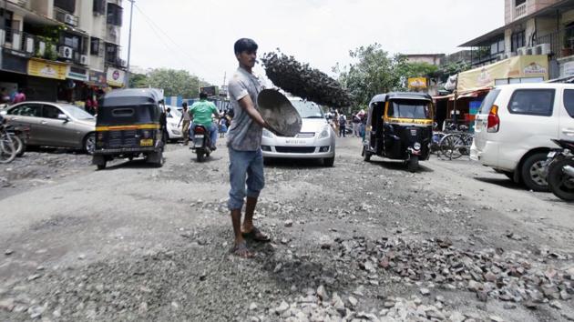 BMC comissioner Ajoy Mehta on Thursday, asked a committee of civic officials conducting the first phase of the inquiry into the Rs1,700-crore road scam to rework its report as it did not specify the punishment to be awarded to the guilty officers. (HT File) BMC comissioner Ajoy Mehta on Thursday, asked a committee of civic officials conducting the first phase of the inquiry into the Rs1,700-crore road scam to rework its report as it did not specify the punishment to be awarded to the guilty officers. (HT File)