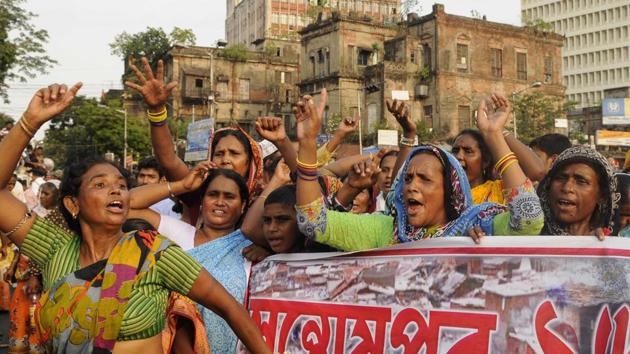 Villagers take part in a rally in Kolkata to protest against acquisition of their land for a power grind project in Bhangar. (HT File Photo) Villagers take part in a rally in Kolkata to protest against acquisition of their land for a power grind project in Bhangar. (HT File Photo)