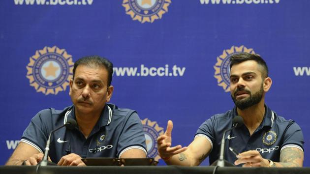 Indian cricket team captain Virat Kohli (R) and coach Ravi Shastri addressed the press before leaving for South Africa on Wednesday evening in Mumbai. (AFP) Indian cricket team captain Virat Kohli (R) and coach Ravi Shastri addressed the press before leaving for South Africa on Wednesday evening in Mumbai. (AFP)