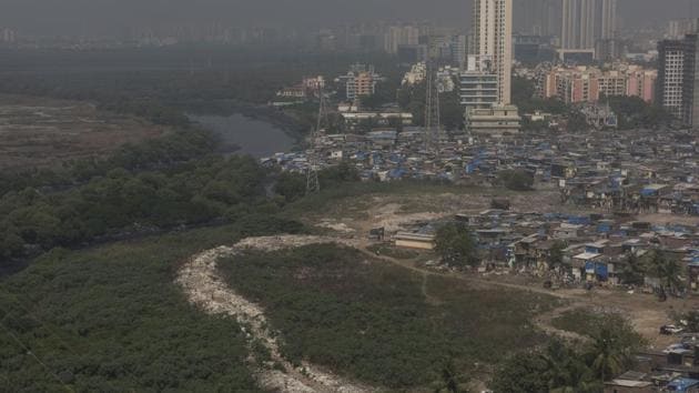 The Lokhandwala Oshiwara Citizens Association (LOCA) on Tuesday filed a complaint with the state mangrove cell and district collector regarding encroachments on the mangrove patch located along the Oshiwara River. (Aalok Soni/HT) The Lokhandwala Oshiwara Citizens Association (LOCA) on Tuesday filed a complaint with the state mangrove cell and district collector regarding encroachments on the mangrove patch located along the Oshiwara River. (Aalok Soni/HT)