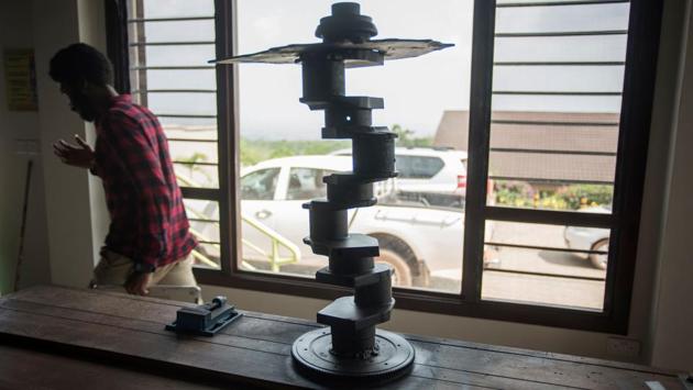 A table made by from pieces of scrap metal found at the dumpsite is pictured at his workshop at Ashesi University. He also wants to exhibit the creations at major galleries around the world and sell them at auction houses. (Cristina Aldehuela / AFP) 